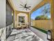Spacious patio with seating area and ceiling fan at 3190 S Jacaranda Ct, Gold Canyon, AZ 85118