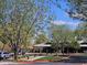 Inviting community clubhouse with covered patios, beautiful landscaping, and convenient parking at 4072 S Skyline Ct, Gilbert, AZ 85297