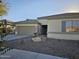 One-story home with attached garage and desert landscaping at 4072 S Skyline Ct, Gilbert, AZ 85297