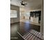 Open concept kitchen and living area with dark cabinetry at 4072 S Skyline Ct, Gilbert, AZ 85297