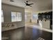 Open kitchen features dark cabinets and an island at 4072 S Skyline Ct, Gilbert, AZ 85297