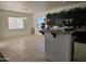 Bright kitchen features granite countertops and dark wood cabinets at 4072 S Skyline Ct, Gilbert, AZ 85297