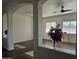 Bright living room with hardwood floors and large windows at 4072 S Skyline Ct, Gilbert, AZ 85297