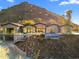 Aerial view of a luxurious home nestled in the mountains at 4129 E Sandy Mountain Rd, Paradise Valley, AZ 85253