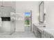 Luxurious bathroom with a large shower, double vanity, and mountain views at 4129 E Sandy Mountain Rd, Paradise Valley, AZ 85253