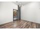 Well-lit bedroom with wood flooring and private access to a patio at 4129 E Sandy Mountain Rd, Paradise Valley, AZ 85253