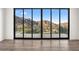 Bright bedroom with sliding glass doors and mountain views at 4129 E Sandy Mountain Rd, Paradise Valley, AZ 85253