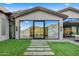 Modern glass doors open to a mountain view at 4129 E Sandy Mountain Rd, Paradise Valley, AZ 85253