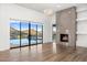 Living room with fireplace and stunning mountain views at 4129 E Sandy Mountain Rd, Paradise Valley, AZ 85253