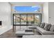 Spacious living room with fireplace and mountain views at 4129 E Sandy Mountain Rd, Paradise Valley, AZ 85253