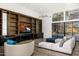 Spacious living room with built-in shelving and hardwood floors at 4129 E Sandy Mountain Rd, Paradise Valley, AZ 85253