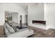 Living room boasts a stunning fireplace and hardwood floors at 4129 E Sandy Mountain Rd, Paradise Valley, AZ 85253