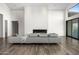 Spacious living room with a modern fireplace and large windows at 4129 E Sandy Mountain Rd, Paradise Valley, AZ 85253