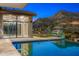 Luxury pool with mountain views and outdoor seating area at 4129 E Sandy Mountain Rd, Paradise Valley, AZ 85253