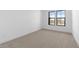 Bedroom with carpet, two windows, neutral paint, and modern trim at 42103 N Cutbow Trl, San Tan Valley, AZ 85140