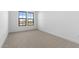 Bedroom with carpet, two windows, and modern trim at 42103 N Cutbow Trl, San Tan Valley, AZ 85140