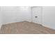 Minimalist bedroom with neutral tile floors and a large closet at 42103 N Cutbow Trl, San Tan Valley, AZ 85140