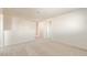 Upstairs hallway with access to bedrooms and bathroom at 42835 W Peters Dr, Maricopa, AZ 85138