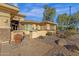 Landscaped walkway to the entrance of a tan house at 4590 E Cloudburst Dr, Gilbert, AZ 85297