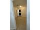Bright bedroom with tile floors and access to kitchen at 5019 W Roma Ave, Phoenix, AZ 85031