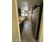 Kitchen with dark cabinets and tile floor at 5019 W Roma Ave, Phoenix, AZ 85031