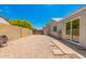 Backyard view of gravel area and partial fence at 5648 W Folley St, Chandler, AZ 85226