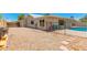 Backyard with a pool, gravel, and partial fence at 5648 W Folley St, Chandler, AZ 85226