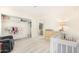 Bedroom with crib, closet, and adjoining bathroom at 5648 W Folley St, Chandler, AZ 85226