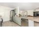 Modern kitchen features stainless steel appliances and granite countertops at 5648 W Folley St, Chandler, AZ 85226