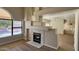 Living room fireplace with marble surround at 5937 E Jensen St, Mesa, AZ 85205