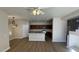 Kitchen with island, stainless steel appliances, and wood cabinets at 5937 E Jensen St, Mesa, AZ 85205