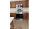 Stainless steel range and microwave in this kitchen at 5937 E Jensen St, Mesa, AZ 85205