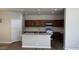 Kitchen with stainless steel appliances and wood cabinets at 5937 E Jensen St, Mesa, AZ 85205