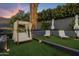 Luxurious backyard with a relaxing patio, pool, and lush landscaping at 7223 N Black Rock Trl, Paradise Valley, AZ 85253