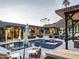 Expansive backyard oasis with a pool, spa, and lounge area at 7223 N Black Rock Trl, Paradise Valley, AZ 85253