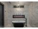 Luxurious bathroom with marble finishes and a freestanding tub at 7223 N Black Rock Trl, Paradise Valley, AZ 85253