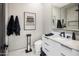 Modern bathroom with marble vanity and black accents at 7223 N Black Rock Trl, Paradise Valley, AZ 85253