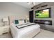 Spacious bedroom with large TV and fireplace at 7223 N Black Rock Trl, Paradise Valley, AZ 85253