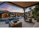 Spacious covered patio overlooking the pool and backyard at 7223 N Black Rock Trl, Paradise Valley, AZ 85253