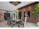 Elegant dining room with glass table and modern chairs at 7223 N Black Rock Trl, Paradise Valley, AZ 85253