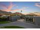 Stunning modern home with mountain views at sunset at 7223 N Black Rock Trl, Paradise Valley, AZ 85253