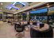 Luxury game room with pool table, bar, and view of backyard oasis at 7223 N Black Rock Trl, Paradise Valley, AZ 85253