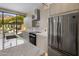 Modern kitchen with stainless steel appliances and marble countertops at 7223 N Black Rock Trl, Paradise Valley, AZ 85253