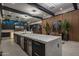 Modern kitchen with marble island and stainless steel appliances at 7223 N Black Rock Trl, Paradise Valley, AZ 85253