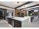 Open concept kitchen with expansive marble island at 7223 N Black Rock Trl, Paradise Valley, AZ 85253