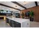 Modern kitchen with large island and bar seating at 7223 N Black Rock Trl, Paradise Valley, AZ 85253