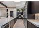 Sleek kitchen featuring marble countertops and stainless steel appliances at 7223 N Black Rock Trl, Paradise Valley, AZ 85253
