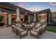 Outdoor patio with fire pit and comfortable seating at 7223 N Black Rock Trl, Paradise Valley, AZ 85253