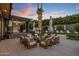 Relaxing patio area with fire pit and comfortable seating at 7223 N Black Rock Trl, Paradise Valley, AZ 85253