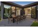 Outdoor patio with dining area and access to main house at 7223 N Black Rock Trl, Paradise Valley, AZ 85253